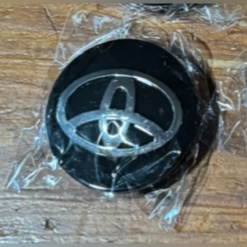 New Toyota black hub cap covers, set of 4. - Picture 2 of 4